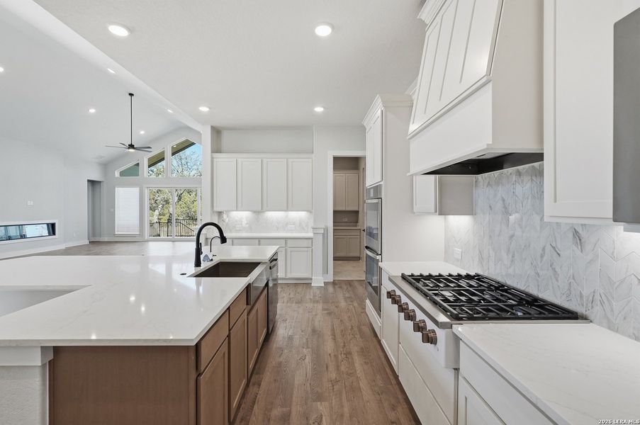 Furnished interior view inside a new home in Potranco Oaks, Castroville (Image 10).