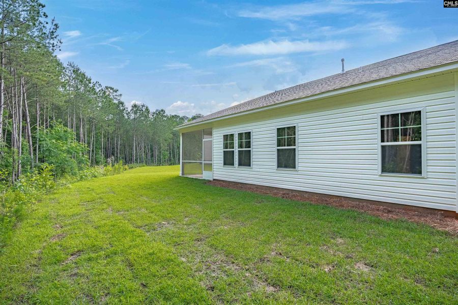 Front exterior of a new home in Rolling Hills, Prosperity, SC, highlighting curb appeal (Image 28).