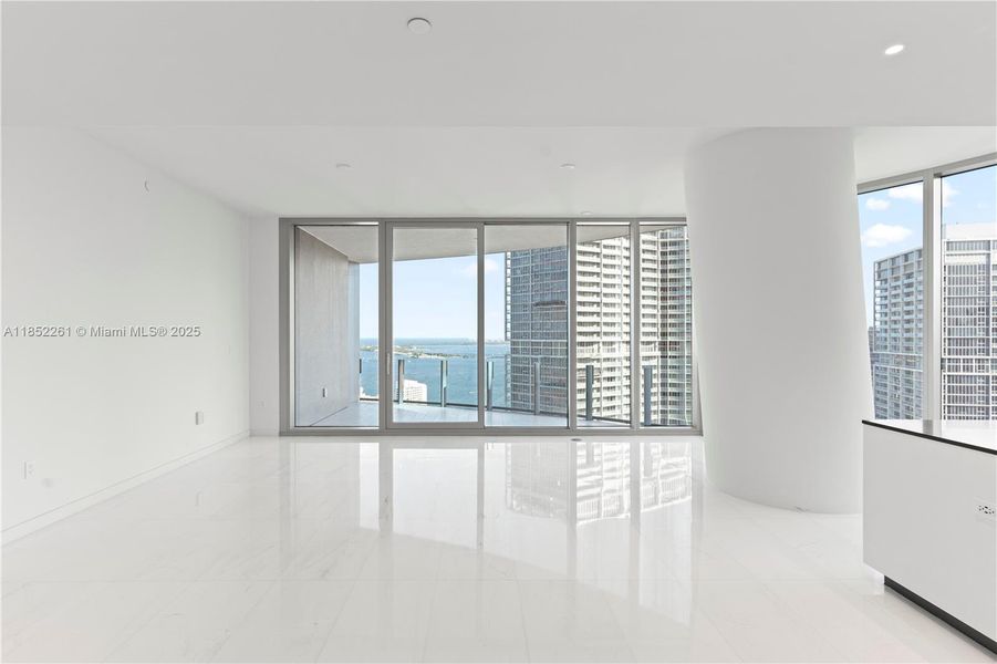 Spacious, unfurnished interior of a new home in Aston Martin Residences, Miami (Image 41).