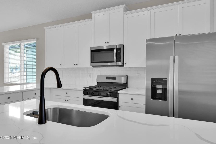 Furnished interior view inside a new home in Jennings Farm, Middleburg (Image 3).
