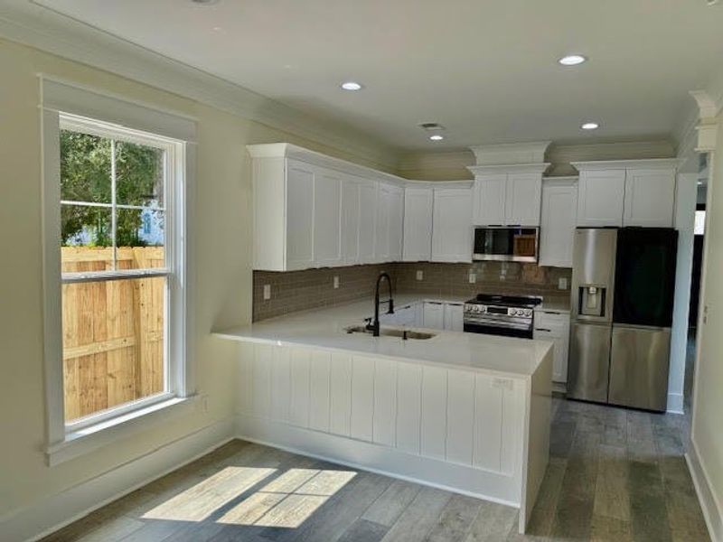 Furnished interior view inside a new home in , North Charleston (Image 7).