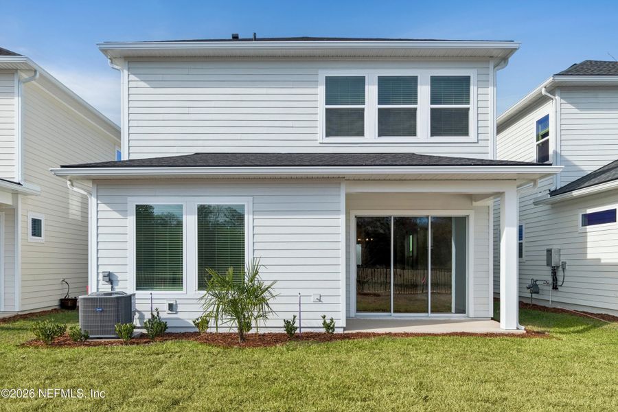 Exterior details and patio area of a home in Granville at eTown 38', Jacksonville (Image 3). Exterior details and patio area of a home in Granville at eTown 38', Jacksonville (Image 3).
