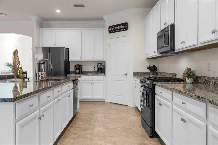 Furnished interior view inside a new home in , Punta Gorda (Image 10).