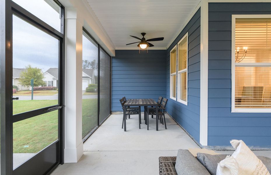 Enjoy a peaceful evening on the extended screened porch.