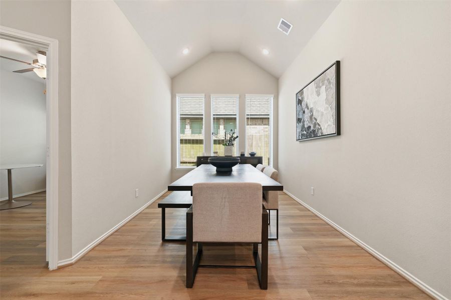 Dedicated dining area with soaring ceilings and plenty of space for hosting family and friends. Dedicated dining area with soaring ceilings and plenty of space for hosting family and friends.