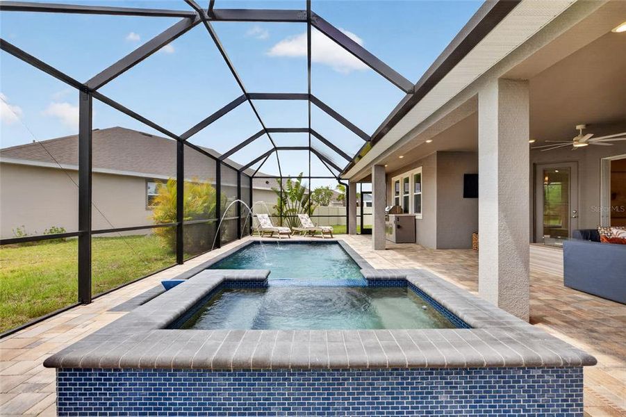 Exterior details and patio area of a home in Seaire, Parrish (Image 26).