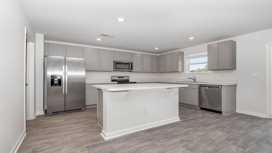 Furnished interior view inside a new home in The Ranch, Holly Hill (Image 5).