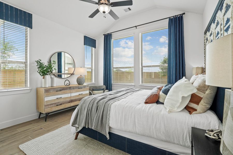 Furnished interior view inside a new home in Bridgeland, Cypress (Image 39).