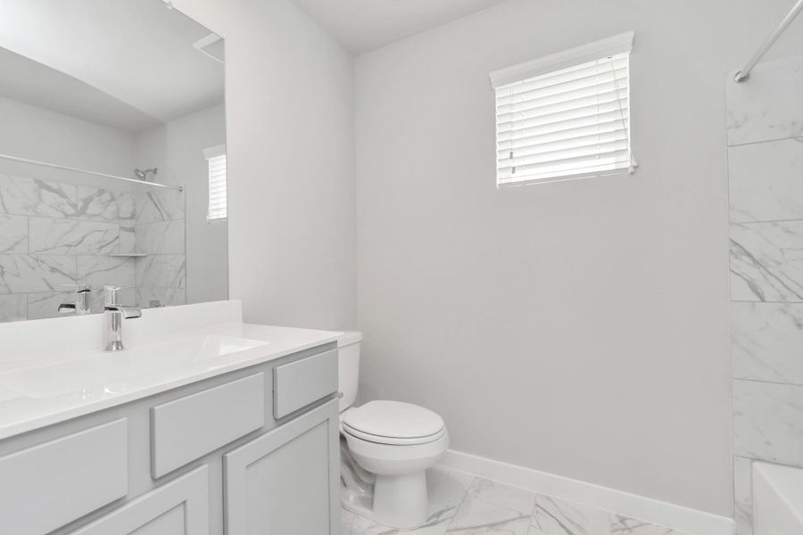Sample photo of completed home with similar floor plan. Actual colors and selections may vary.