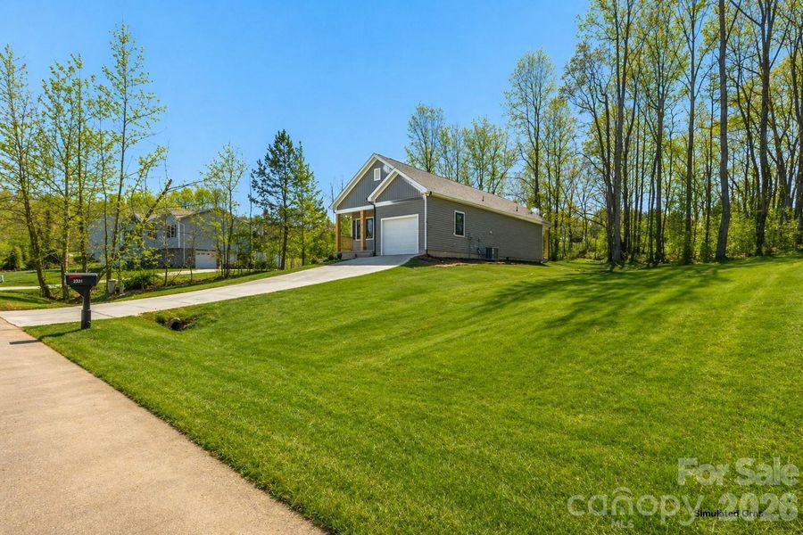 Front exterior of a new home in , Hudson, NC, highlighting curb appeal (Image 21).