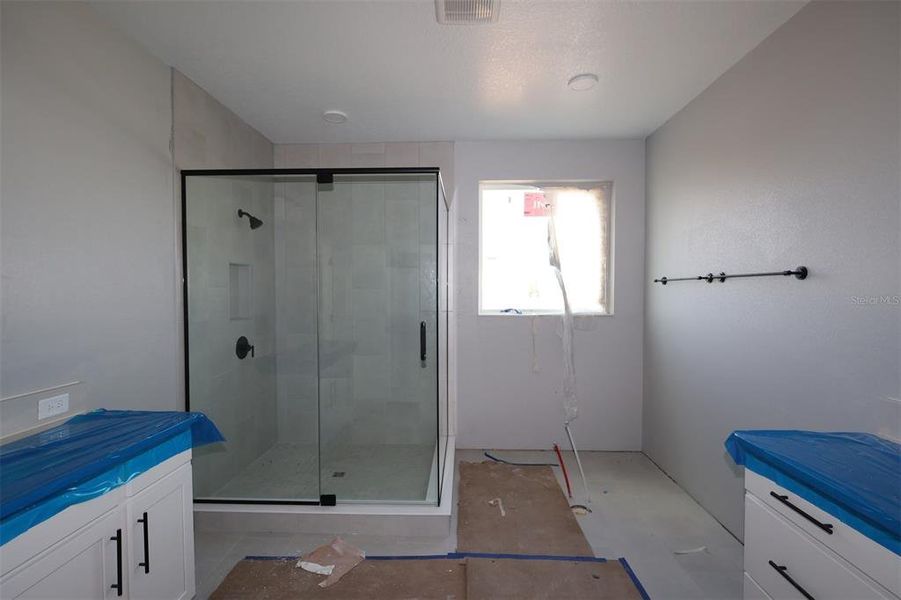 In-progress construction of a new home in Center Lake on the Park, St. Cloud, FL (Image 14).