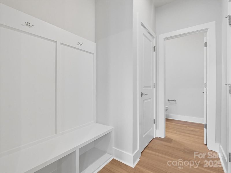 From garage entry a drop zone awaits to provide ease.