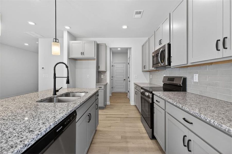 Furnished interior view inside a new home in Sanders Park, Austell (Image 8).