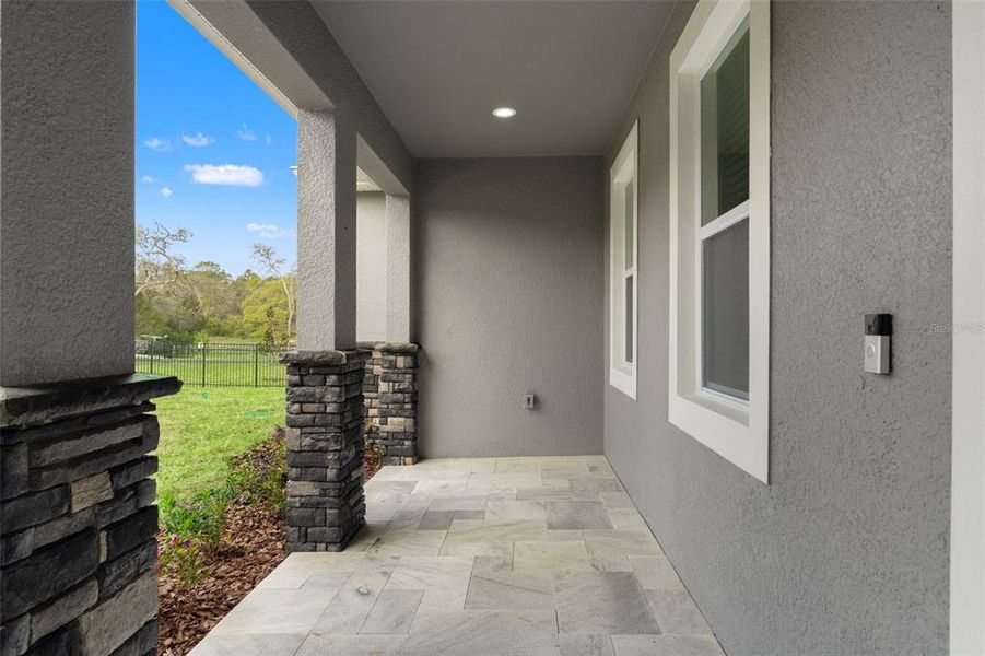 Exterior details and patio area of a home in , Spring Hill (Image 20).