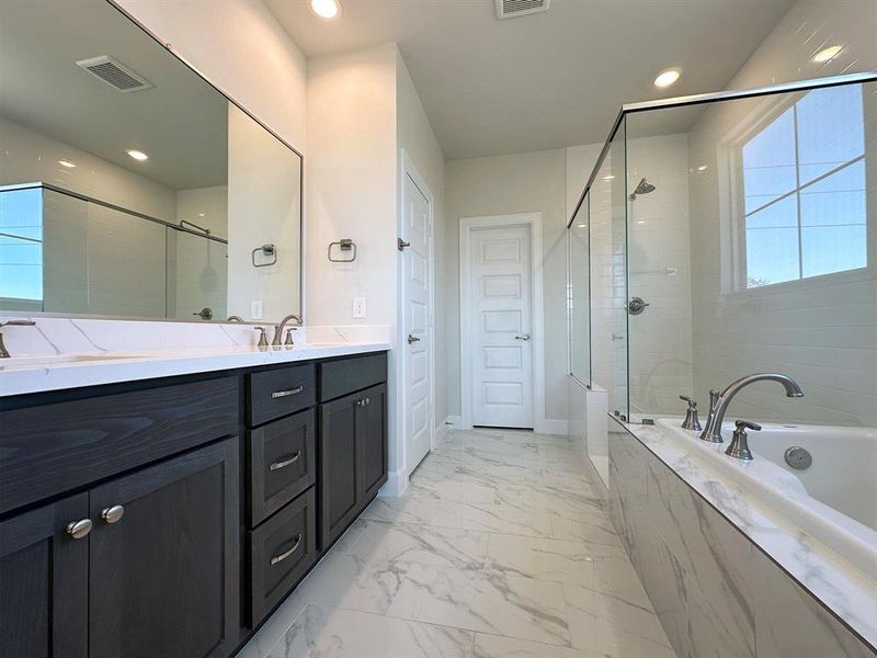 3rd Floor - Primary Bathroom with Dual Vanity sinks.