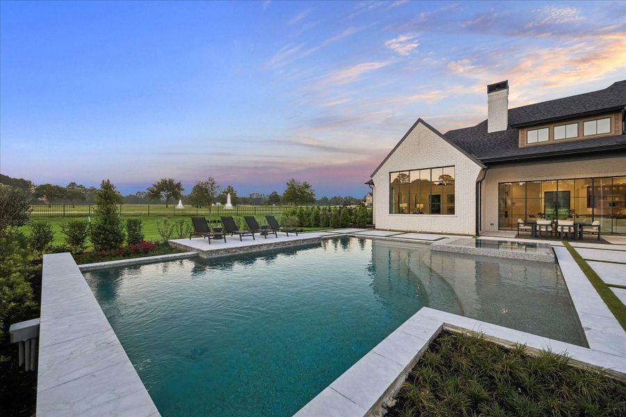 Exterior details and patio area of a home in Stallion Lakes, Hockley (Image 25).