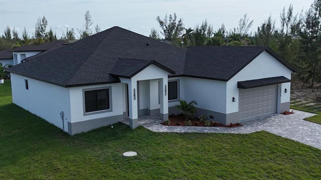 Front exterior of a new home in , Port Charlotte, FL, highlighting curb appeal (Image 31). Front exterior of a new home in , Port Charlotte, FL, highlighting curb appeal (Image 31).