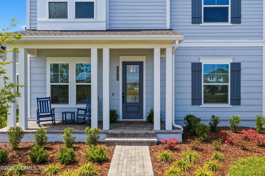 Exterior details and patio area of a home in Seven Pines 50' Rear Entry, Jacksonville (Image 3).