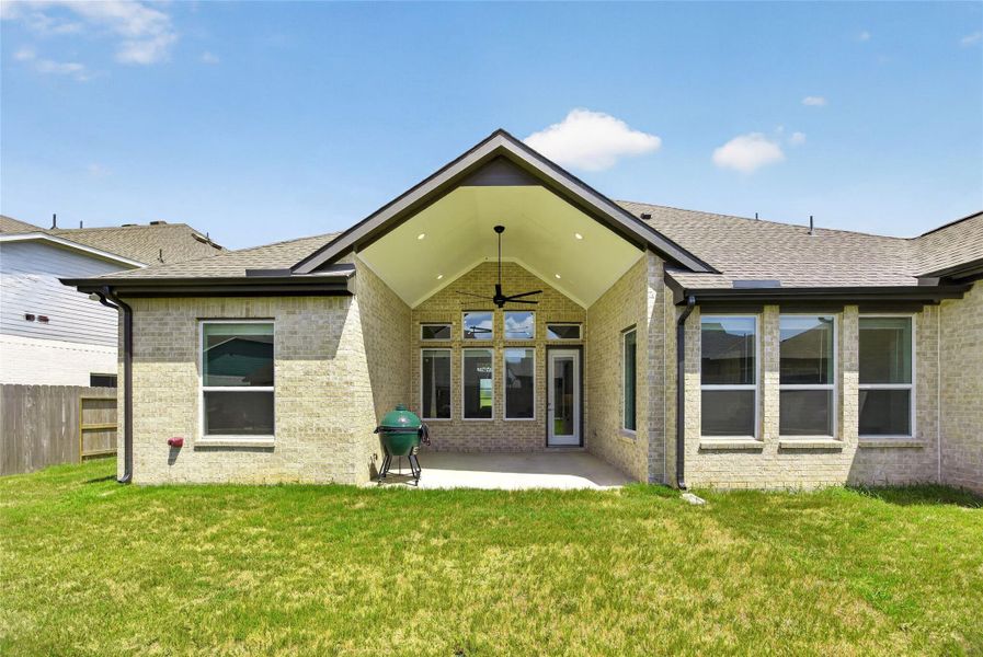 Exterior details and patio area of a home in Fulshear Lakes, Fulshear (Image 25).
