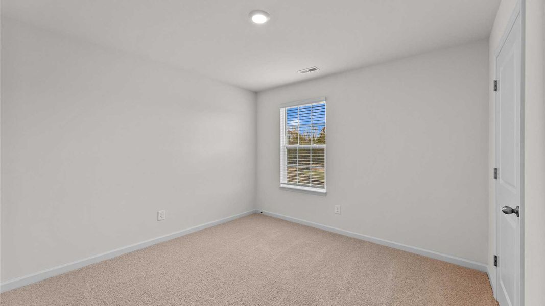 Spacious, unfurnished interior of a new home in Beaver Dam Crossing, Bailey (Image 22).