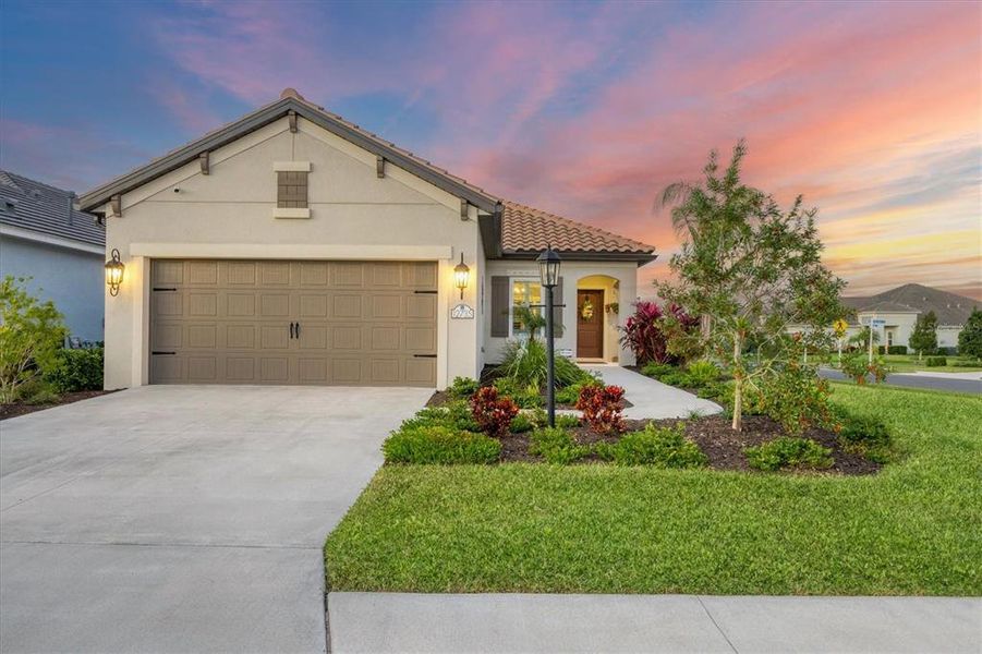 Front exterior of a new home in , Bradenton, FL, highlighting curb appeal (Image 1). Front exterior of a new home in , Bradenton, FL, highlighting curb appeal (Image 1).
