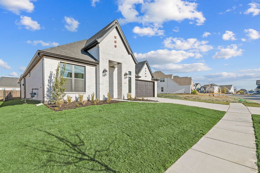 Front exterior of a new home in Parks of Aledo, Aledo, TX, highlighting curb appeal (Image 25).