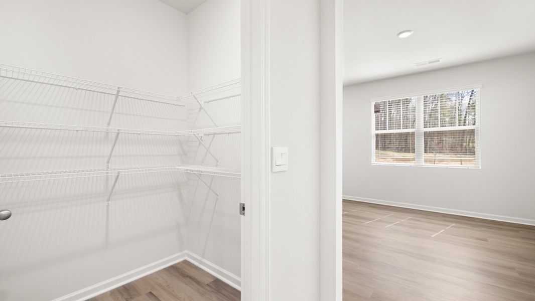 Representative unfurnished interior of a home built from the Halton by D.R. Horton in South Wind, South Fulton (Image 15).