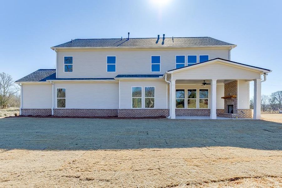 Front exterior of a new home in , Gainesville, GA, highlighting curb appeal (Image 1).