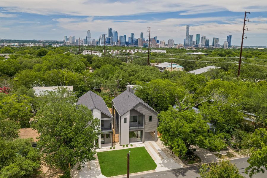Newly constructed, modern homes with private yards and city skyline views.