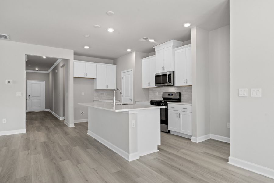 Furnished interior view inside a new home in Waterside - Coastline Series, Longs (Image 3).