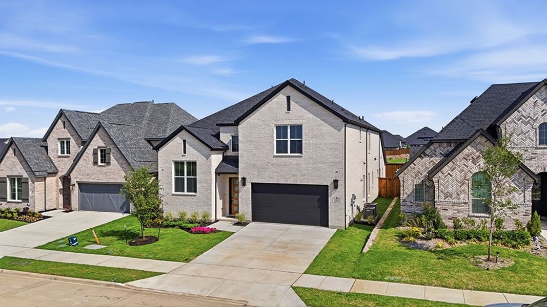 Front exterior of a new home in Hillside Village, Celina, TX, highlighting curb appeal (Image 23).