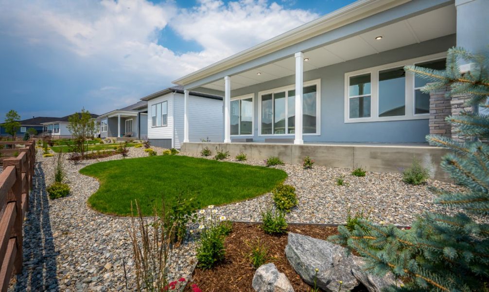 Exterior details and patio area of a home in Wolf Ranch - Enclave Collection, Colorado Springs (Image 3).