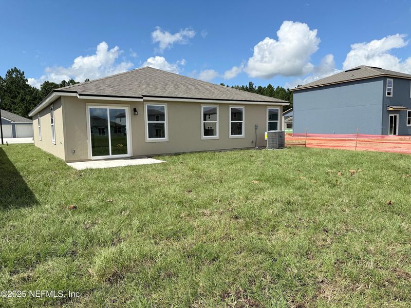 Exterior details and patio area of a home in The Arbors, Jacksonville (Image 4).