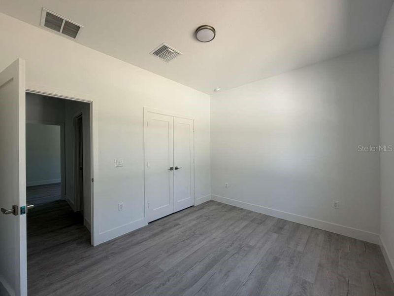 Spacious, unfurnished interior of a new home in , Port Charlotte (Image 18).