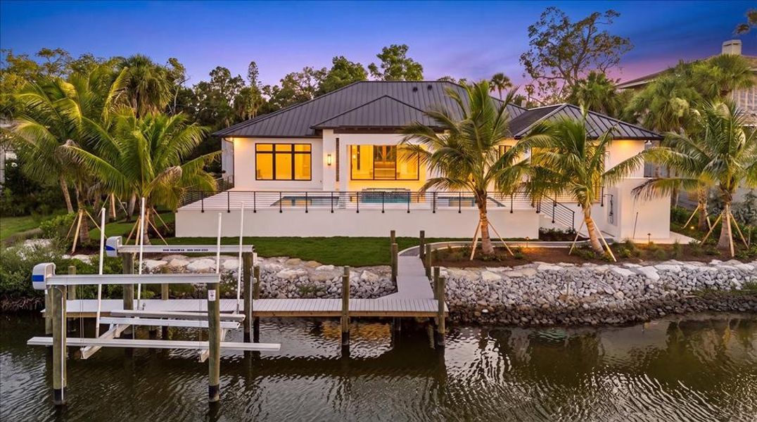 Front exterior of a new home in , Sarasota, FL, highlighting curb appeal (Image 30).