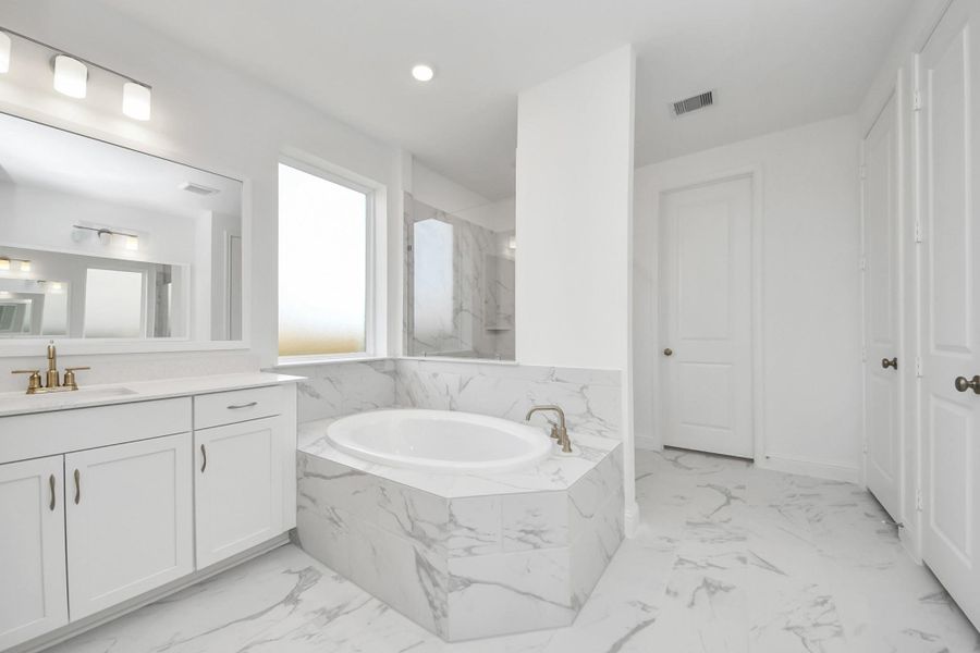 Furnished interior view inside a new home in ARTAVIA, Conroe (Image 4).