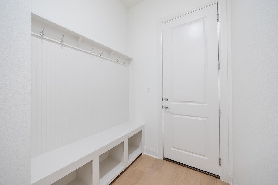 Mudroom featuring light wood-type flooring