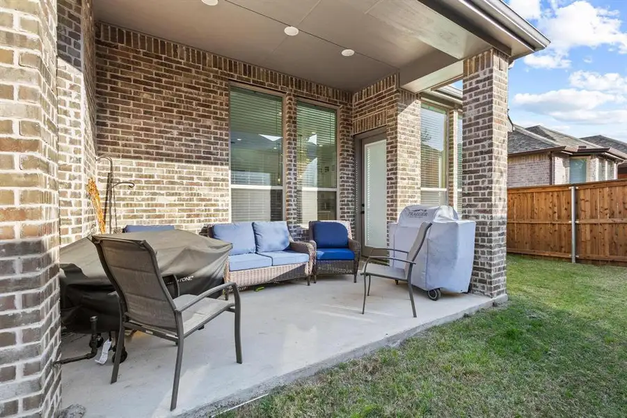 Exterior details and patio area of a home in Gateway Village - The Reserve, Denison (Image 3).
