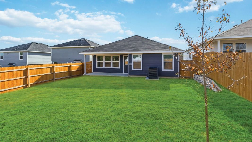 Exterior details and patio area of a home in Wayside, Uhland (Image 24).