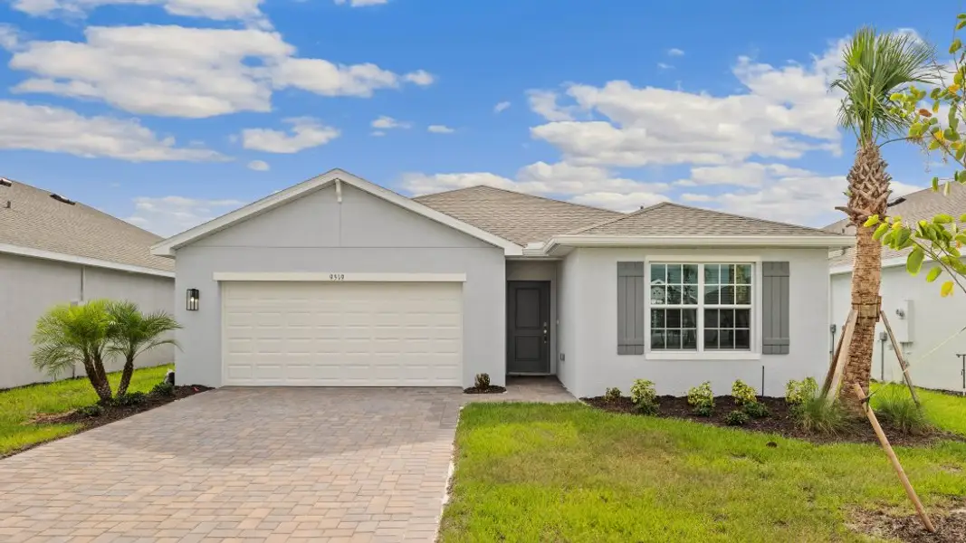Front exterior of a new home in Cape Coral Water & Sewer, Cape Coral, FL, highlighting curb appeal (Image 1). Front exterior of a new home in Cape Coral Water & Sewer, Cape Coral, FL, highlighting curb appeal (Image 1).