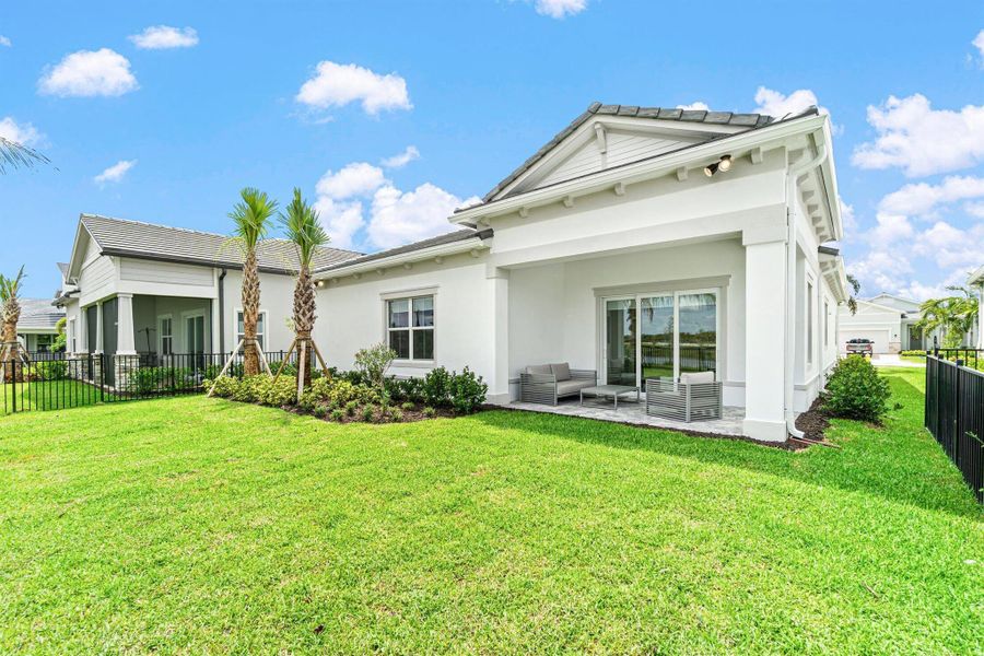 Exterior details and patio area of a home in Avondale at Avenir, Palm Beach Gardens (Image 27).