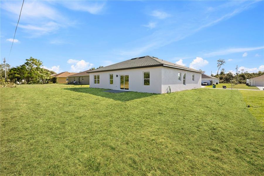 Exterior details and patio area of a home in , Ocala (Image 24).