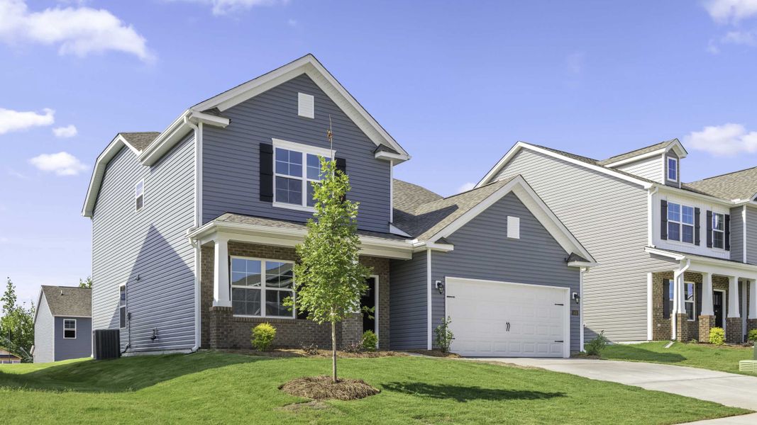 Front exterior of a new home in Cambridge Park, Mebane, NC, highlighting curb appeal (Image 2).