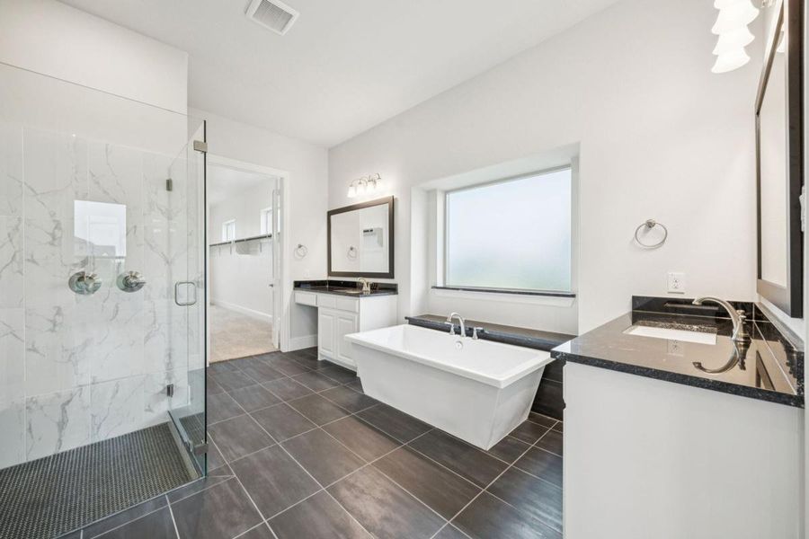 Representative furnished interior of a home built from the Grand Maison III by Grand Homes in Kings Crossing, Parker (Image 8).