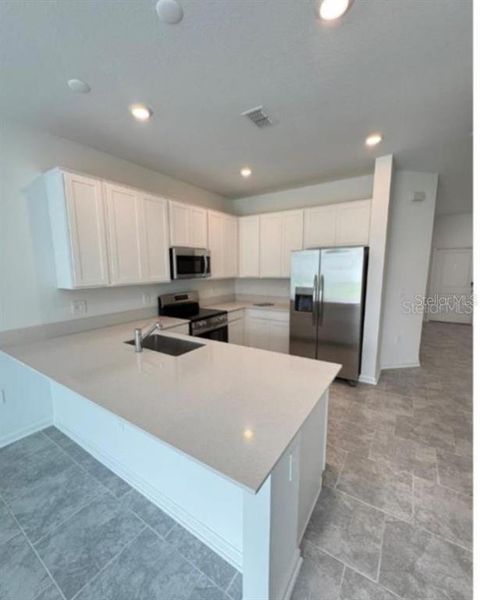 Furnished interior view inside a new home in , Davenport (Image 6).