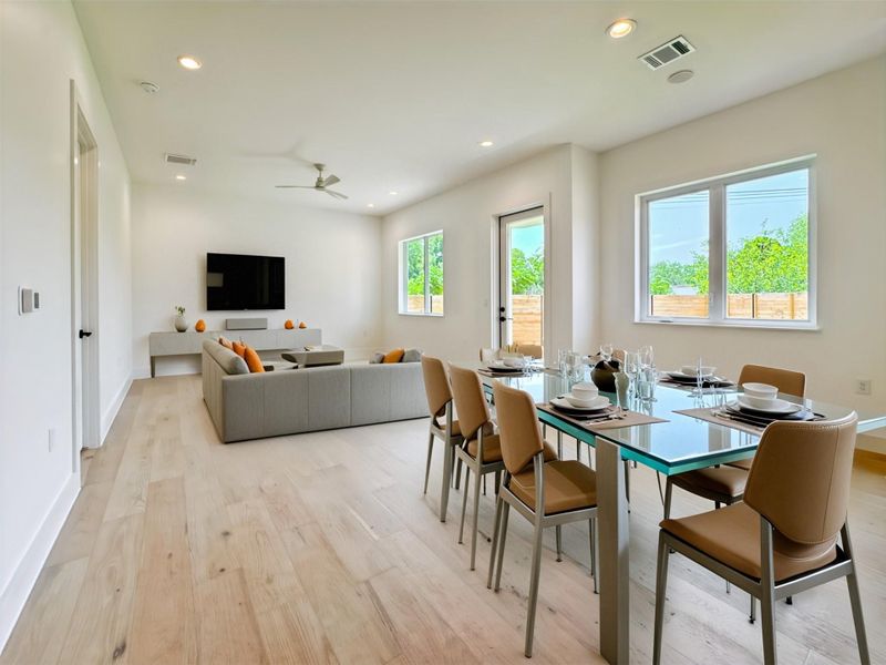 Dining area featuring light wood-style flooring, a ceiling fan, recessed lighting Dining area featuring light wood-style flooring, a ceiling fan, recessed lighting