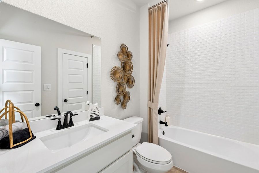 Representative furnished interior of a home built from the Upton by Scott Felder Homes in Crown Ridge Manor, San Antonio (Image 14).