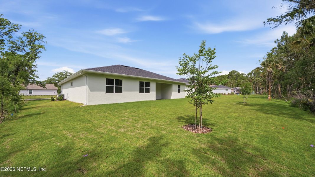 Exterior details and patio area of a home in , Palm Coast (Image 29).