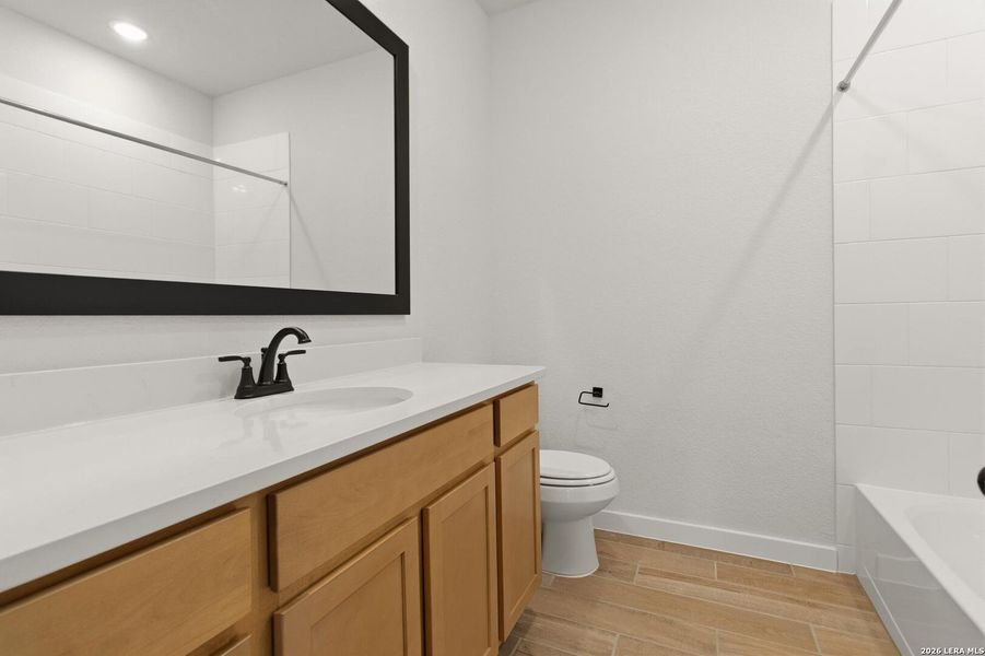 Furnished interior view inside a new home in Alamo Estates, San Antonio (Image 8).