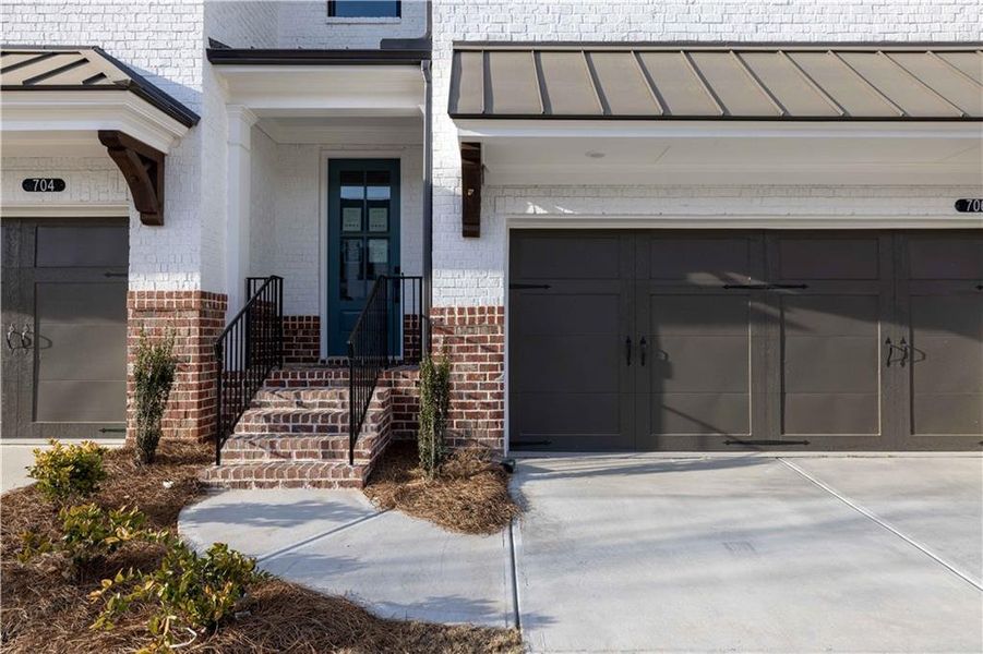 Exterior details and patio area of a home in Millcroft Townhomes, Buford (Image 23).